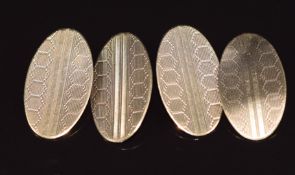 A pair of 9ct gold cufflinks with engine turned decoration, 3.9g