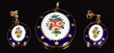 A 9ct gold pendant set with an enamel panel depicting flowers on a blue ground, with matching