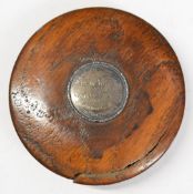 19thC oak and white metal circular patch box, the central cartouche impressed 'Made from wood