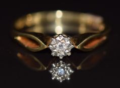 An 18ct gold ring set with a diamond in an illusion setting, 3.2g, size N