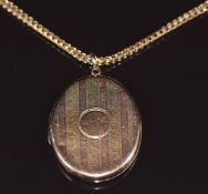 A 9k gold chain/ necklace (9.7g) and a 9ct gold back and front locket