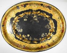 Two Victorian papier maché trays, the larger with retailer's stamp verso for I J Mechi, 112 Regent