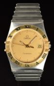 Omega Constellation gentleman's wristwatch with date aperture, luminous hands, gold dial, black