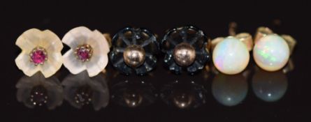Three pairs of 9ct gold earrings set with opals, rubies and quartz and onyx, 2g