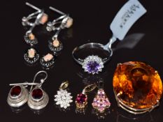 Three 9ct gold pendants set with garnet and diamonds, diamonds and pink sapphires (3.3g), a silver