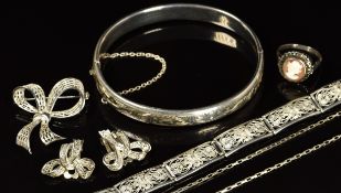 A silver ring set with a cameo, silver bangle, silver necklace, silver bracelet and brooch