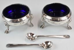 Pair of Georgian hallmarked silver hoof footed open salts with blue glass liners and silver plated