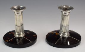 Art Deco pair of hallmarked silver and tortoiseshell candlesticks, with reeded columns and inlaid
