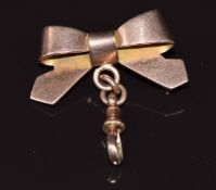 A 9ct rose gold bow brooch with clip attachment, 6.4g 3.3x3.5cm