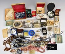 A collection of costume jewellery including pearl earrings, coral necklace, Art Deco brooch,