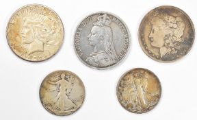 1890 Morgan USA silver Dollar, a 1922 Liberty Dollar, two walking Liberty half Dollars 1918 and 1936