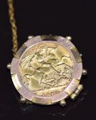 A 1913 gold half sovereign, in 9ct gold brooch mount, 6.3g