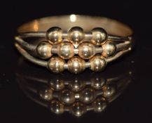 A 9ct gold abacus design ring with movable spheres, 1.7g, size P/Q