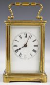 19th or early 20thC brass cased carriage clock, the white enamel dial having Roman numerals,