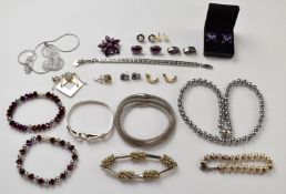 A collection of costume and silver jewellery including Dyrberg Kern bracelet, 14k gold earrings