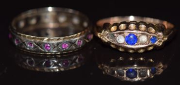 A 9ct gold ring set with paste, Birmingham 1916, and a 9ct gold eternity ring set with rubies, 3.7g,
