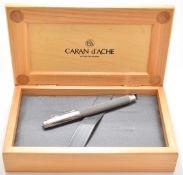 Caran d'Ache Varius Ivanhoe or similar fountain pen with woven stainless steel shaft, octagonal