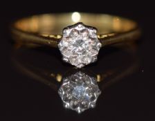 An 18ct gold ring set with a diamond in a platinum illusion setting, 2g, size L