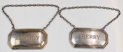 Pair of Elizabeth II hallmarked silver bottle tickets or labels for Sherry and Brandy, Sheffield