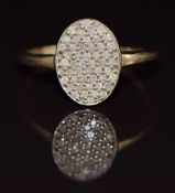 A 9ct gold ring set with diamonds in an oval setting, 1.9g, size N
