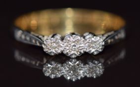 An 18ct gold ring set with diamonds in a platinum setting, 2.2g, size P