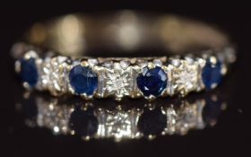 A 9ct gold ring set with sapphires and diamonds, 1.4g, size N