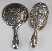 Victorian hallmarked silver hand mirror and brush decorated with Reynolds angels, Chester 1900,