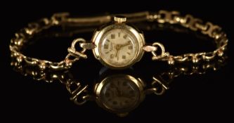 Rotary 9ct gold ladies wristwatch with gold hands and Arabic numerals, silver dial and movement,
