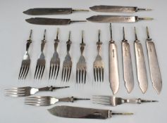 Hallmarked silver fish fork tynes and knife blades, weight 416g