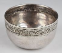 Burmese or similar silver bowl with hammered and embossed decoration and marked 925 to base,