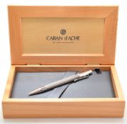 Caran d'Ache Varius Ivanhoe or similar propelling pencil with woven stainless steel shaft, in wooden