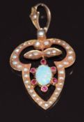 Art Nouveau 9ct rose gold pendant set with an opal, rubies and seed pearls, maker CF, 2.8g, 3.8 x