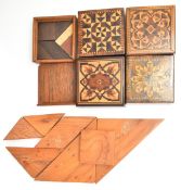 A collection of Tangram puzzles including four Tunbridge ware examples, most 5 x 5cm