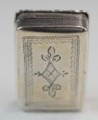 Georgian hallmarked silver vinaigrette, the engraved lid having raised scrolling edge, opening to