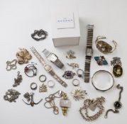 A collection of silver jewellery including Malcolm Gray brooch, bangle, necklaces, brooches,