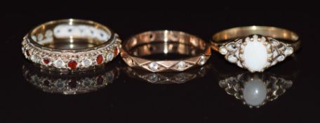 A 9ct gold ring set with an opal and two 9ct gold eternity rings, 6.2g