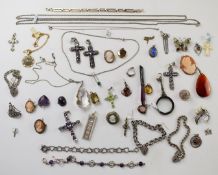 A collection of silver jewellery including four cross pendants set with amethysts, pendants,