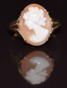 A 9ct gold ring set with a cameo depicting a young woman, 5.4g, size P