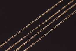 A c1900 9ct rose gold double strand necklace made up of oval and elongated links with barrel