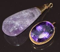 Two c1920 9ct gold pendants set with amethysts, 16.9g