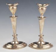 Mappin & Webb Elizabeth II pair of hallmarked silver candlesticks, Sheffield 1958, height 18cm