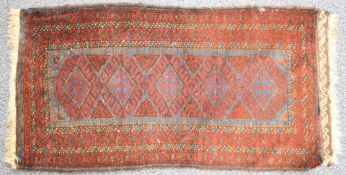 Small Turkoman prayer rug with five guls on a wine ground, 102 x 56cm