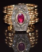 A 14ct gold metamorphic ring / bracelet set with an oval ruby of approximately 0.5ct surrounded by