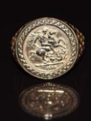 A 9ct gold ring set with faux 9ct gold coin, 2.2g, size R