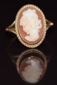 A 9ct gold ring set with a cameo depicting a young woman, 3.2g, size K