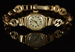 Rotary 9ct gold ladies automatic wristwatch with gold hands and Arabic numerals, silver dial and