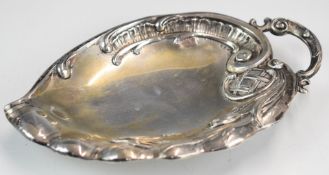 German 800 grade silver leaf dish raised on three ball feet, length 18cm, weight 102g