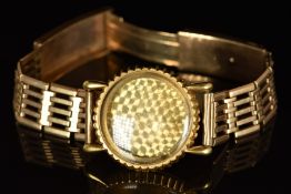 Omega 18ct gold wristwatch case on a 9ct gold bracelet, case diameter 36mm, serial number