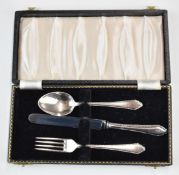 Cased hallmarked silver cutlery set comprising knife, fork and spoon, Birmingham 1961, maker William