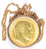 1905 Edward VII gold half sovereign, in mount marked 9ct, on chain marked 9c, total weight 7.54g